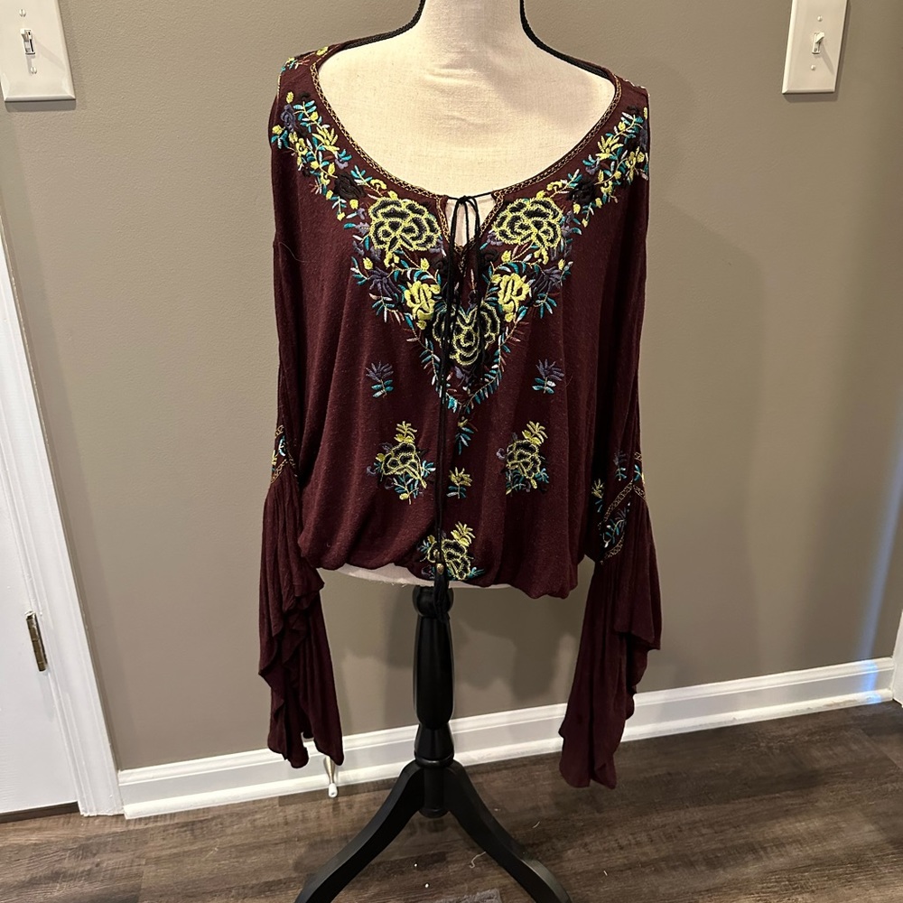 Free People embroidered billowy floral top with bell sleeves. Worn once. Size XS